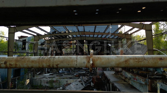 Rising Drone Shot Past Rusted Framework at Ptarmigan Mine Ruins