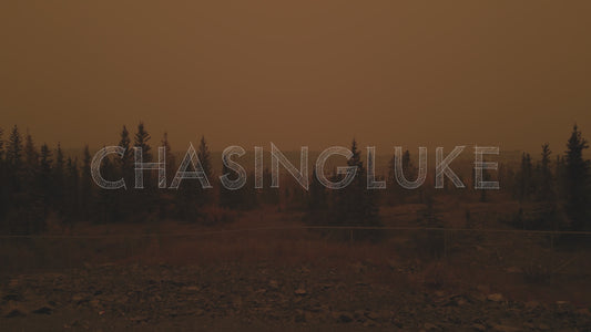 Rising Drone Shot Reveals Giant Mine Through Wildfire Smoke