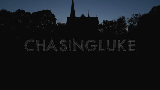 Sunset Rise Revealing St. Joseph’s Church Spires and Glowing Cross