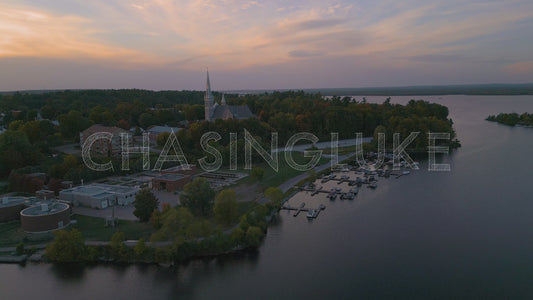 Sunset Strafe Over River Revealing Marina, St. John Chrysostom, and Sewage Plant