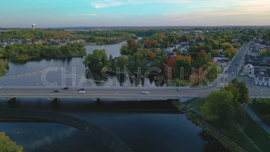 Early Autumn Reverse Shot Revealing Island Below Arnprior Man-Made Waterfall