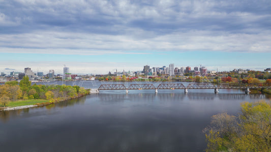 Drone Flyover of Chief William Commanda Bridge Toward Downtown Ottawa Skyline