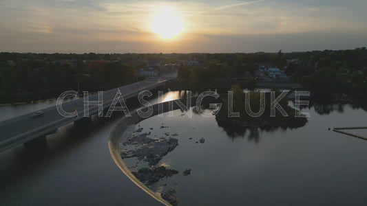 Golden Hour Tilt-Down Over Arnprior Bridge and Man-Made Waterfall