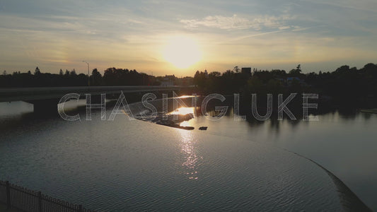 Golden Hour Rise Over Arnprior Bridge With Sundogs and Waterfall View