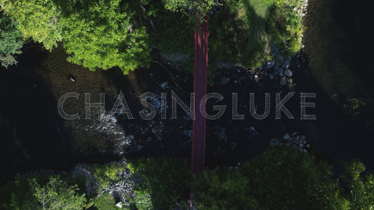 Top-Down Static Aerial Over Red Bridge and Rapids on Tay River
