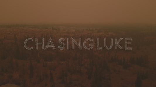 Drone Approaches Lake Through Heavy Wildfire Smoke