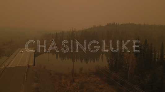 Car Emerges From Wildfire Smoke on Ingraham Trail, Yellowknife River Tracking View