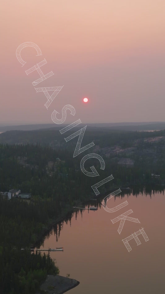 Vertical Zoom Out Over Smoky Madeline Lake Down to Ingraham Trail