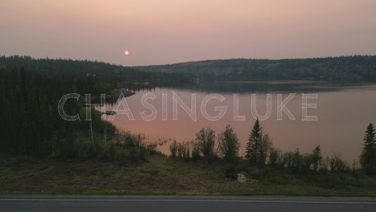 Smoky Red Sun Over Madeline Lake